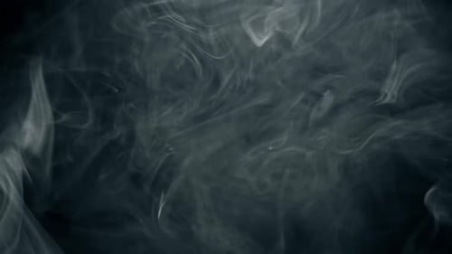 Abstract White Smoke Billowing on Black Background