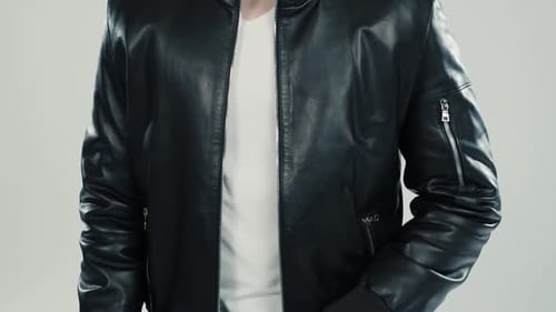 Close-up of Leather Jacket Details on Dancing Man and Woman