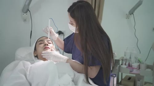 Woman Getting Facial at Medical Spa