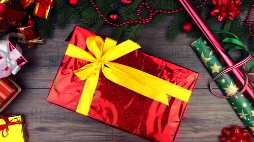 Christmas Gift Picked Up on Holiday Table