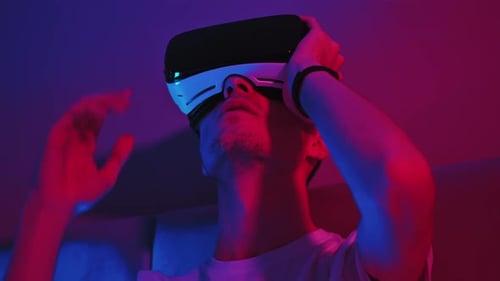 Young Man Wearing Virtual Reality Headset