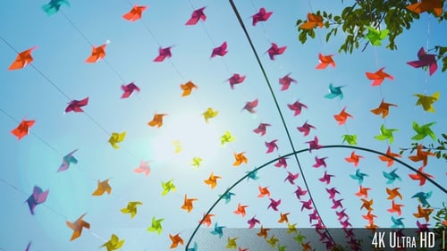 Colorful Pinwheels Decorating a Bright Blue Sky