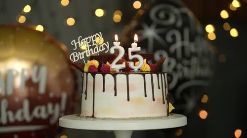 Decorated Cake with Candles and Balloons