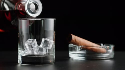 Whiskey Pour with Cigar