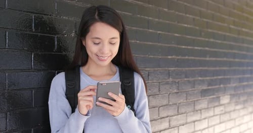 Woman use of smart phone at outdoor