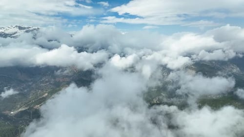 Cloudy landscape high in the mountains aerial view 4 K