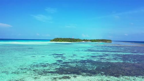 Aerial top view panorama of relaxing coastline beach break by blue water with bright sandy backgroun