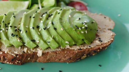 Healthy Avocado Toast with Salad on Plate