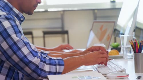 Young Professionals Working Together in Modern Office