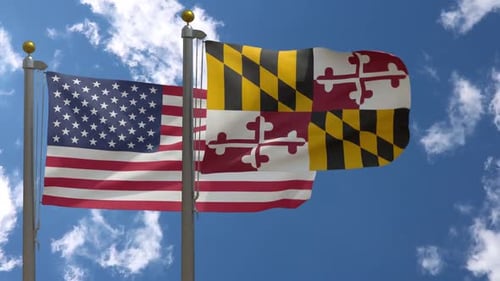 United States and Maryland Flags Waving on Flagpoles