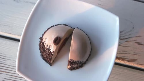 Elegant Coffee Dessert on White Plate Close Up
