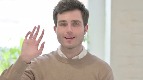 Portrait of Man Waving Welcoming