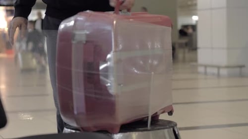 Wrapping baggage at the airport