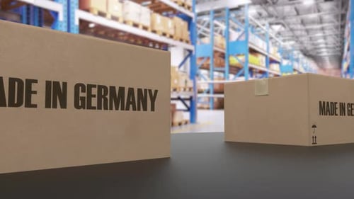Boxes with MADE IN GERMANY Text on Conveyor