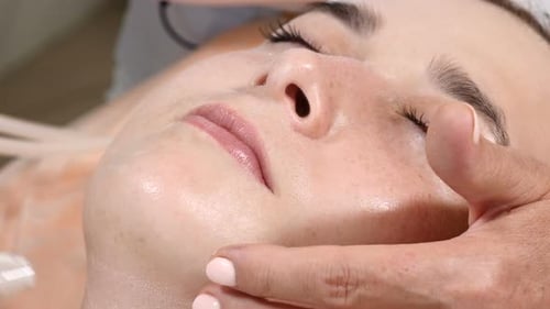 Microcrystalline Dermabrasion Sanding in Beauty Clinic. Hardware Cosmetology. Young Woman Getting