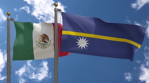 Waving Flags of Mexico and Nauru Against a Blue Sky