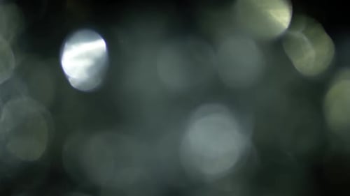 Multicolored Light Leaks Footage on Black Background. Stylizing Video, Transitions. Bokeh Effect