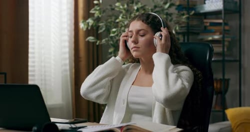 Young Adult Taking Relaxing Break with Headphones