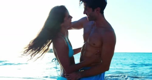 Couple romancing at beach