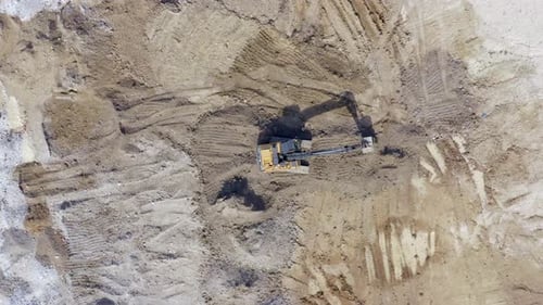 Excavator Working on Construction Site, Aerial View