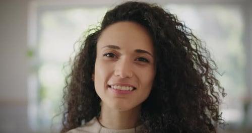 Beautiful happy young woman smiling