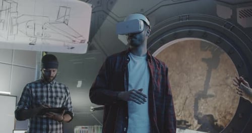 Engineers Working on a VR Space Mission