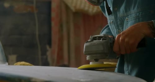 Man grinding surfboard 4k
