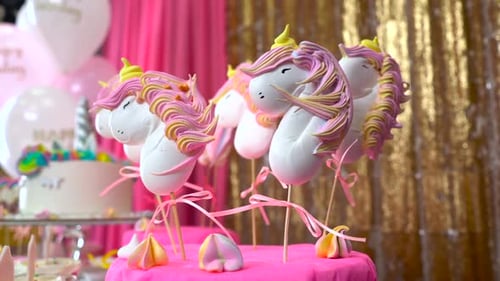 Children's Birthday Party. Unicorn Themed Treats, Against Colorful Background. Close-up