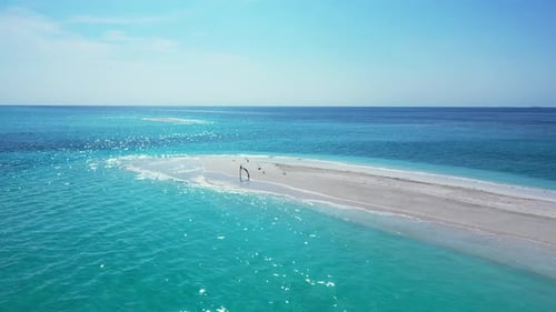 Daytime fly over abstract view of a white sandy paradise beach and blue ocean background in high res