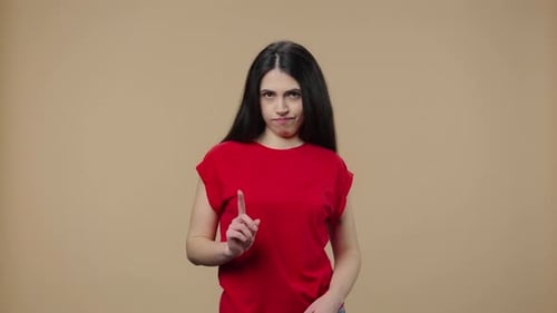 Woman Shakes Head in Disagreement