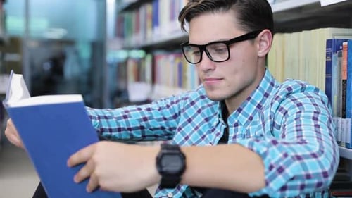 Read Book. Student At Library Reading Book, Learning