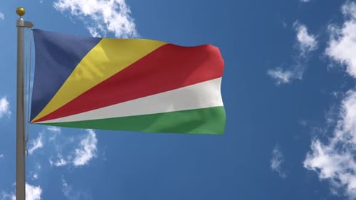 Seychelles National Flag Waving in Blue Sky with Clouds
