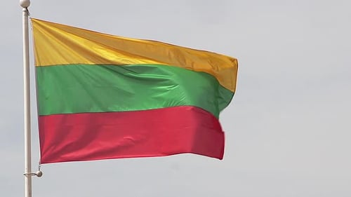 Lithuanian Flag Waving Proudly in the Wind