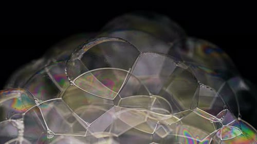 Iridescent soap bubbles abstract background