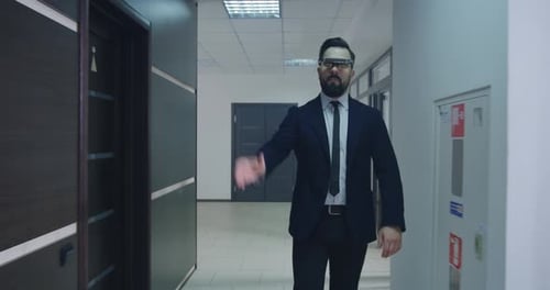 Businessmen Using VR Glasses in Office Corridor