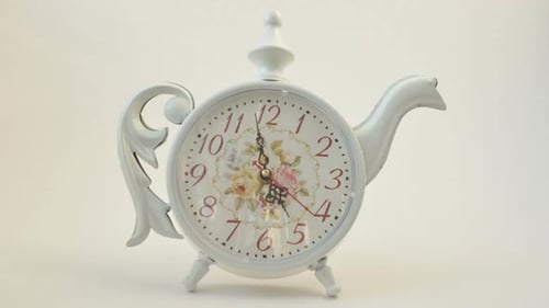 Vintage Clock Shaped Like a Teapot on White