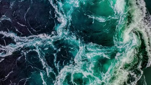 Waves of Water of the River and the Sea Meet Each Other During High Tide and Low Tide