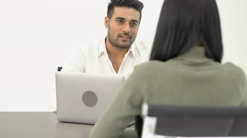 Business man interviewing woman