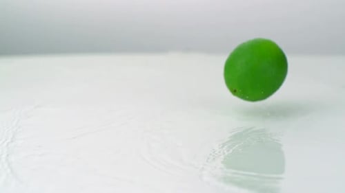 Slo-motion limes falling