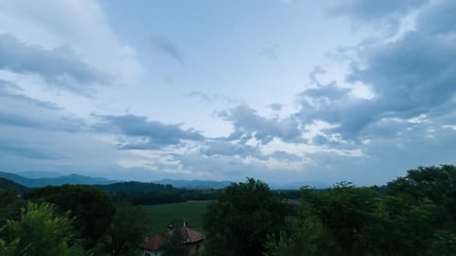 Time Lapse of clouds over mountains.