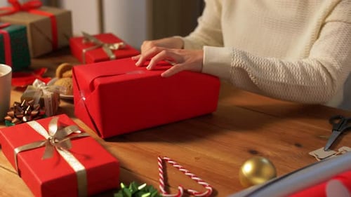 Christmas Gift Wrapping at a Festive Home Setting
