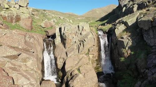 Waterfall Rocks And Hills