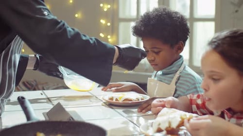 Girl Eating Waffle on Culinary Class