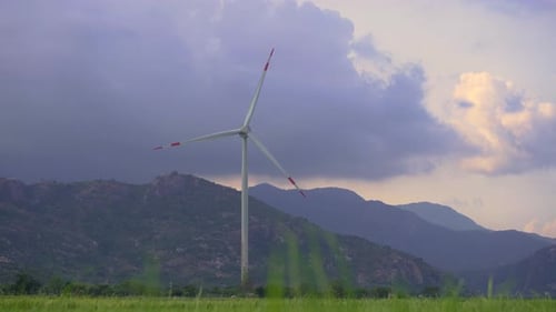 Wind Turbine Spinning in a Green Field