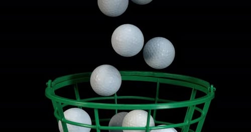Pelotas de golf cayendo sobre fondo negro, cámara lenta 4K