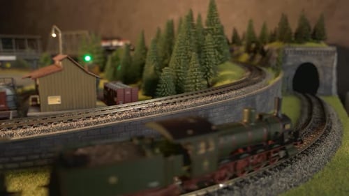 Passenger Trains on Miniature Railway Train Station Model.