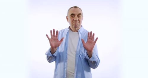 A Man Showing Prohibition Gesture. Isolated on White.