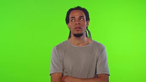 Young Man Bored and Yawning on Green Screen