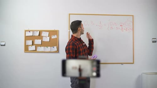 Young Adult Man Teaching Math Online