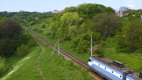 Electric Train Locomotive Moving On Railroad